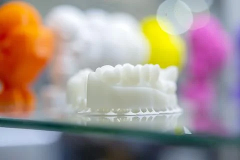 White object 3D printed from plastic close-up. New 3D printing technology. Stock Photos