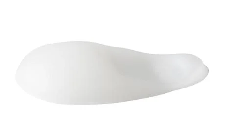 A white object with a white substance on it Stock Photos