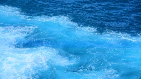 White ocean waves on blue sea hit coastal rocks. Summer landscape	 Stock Footage 122606824