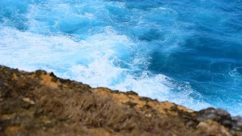 White ocean waves on blue sea hit coastal rocks. Summer landscape	 Video stock 122607326