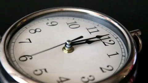 White office clock close up. Twelve oclock Stock Footage 73762405