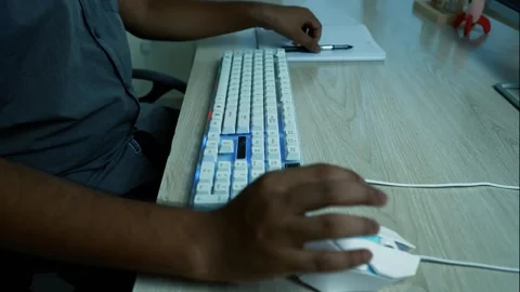 White Office Desk Table with Computer Keyboard and Person Typing Stock Footage 315982524