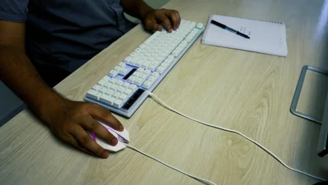 White Office Desk Table with Computer Keyboard and Person Typing Stock Footage 315982540
