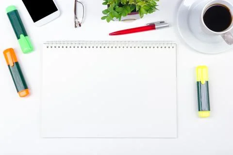 White Office desk table with computer, pen and a cup of coffee, lot of thin.. Stock Photos
