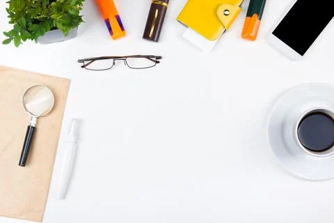 White Office desk table with computer, pen and a cup of coffee, lot of thin.. Stock Photos