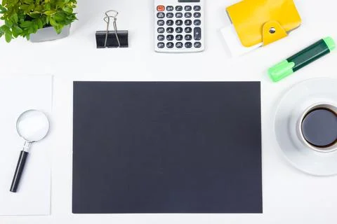 White Office desk table with computer, pen and a cup of coffee, lot of thin.. Stock Photos