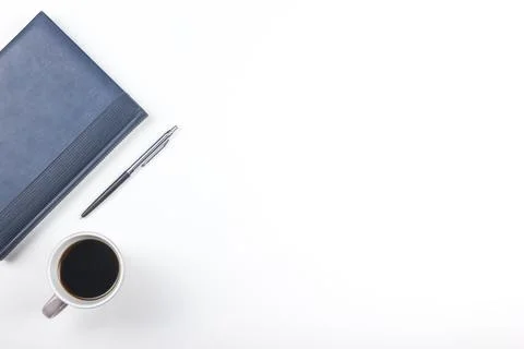 White Office desk table with computer, pen and a cup of coffee, lot of thin.. Stock Photos