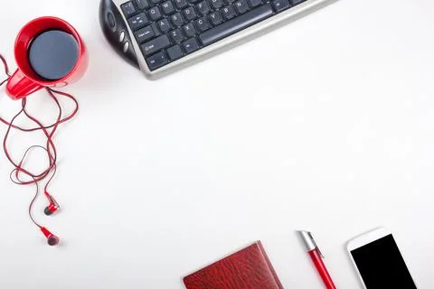 White Office desk table with computer, pen and a cup of coffee, lot of thin.. Stock Photos