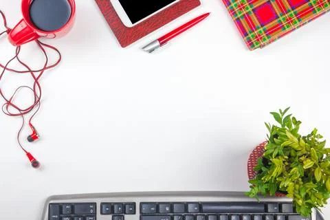 White Office desk table with computer, pen and a cup of coffee, lot of thin.. Stock Photos