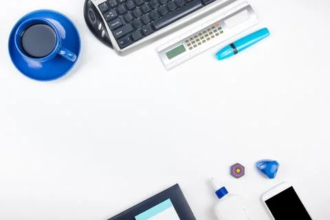 White Office desk table with computer, pen and a cup of coffee, lot of thin.. Stock Photos