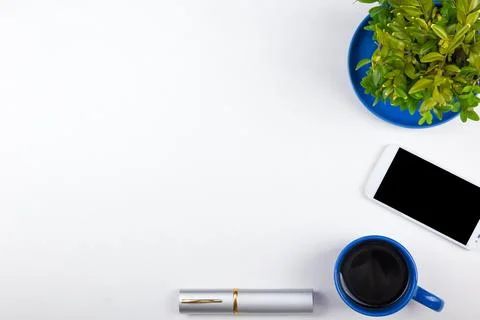 White Office desk table with computer, pen and a cup of coffee, lot of thin.. Stock Photos