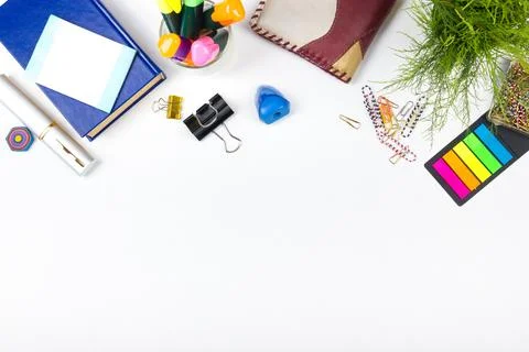 White Office desk table with computer, pen and a cup of coffee, lot of things Stock Photos
