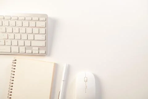 White office desk table with computer, supplies and coffee cup Stock Photos