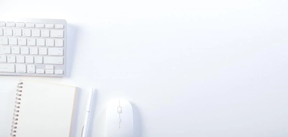 White office desk table with computer, supplies and coffee cup Stock Photos