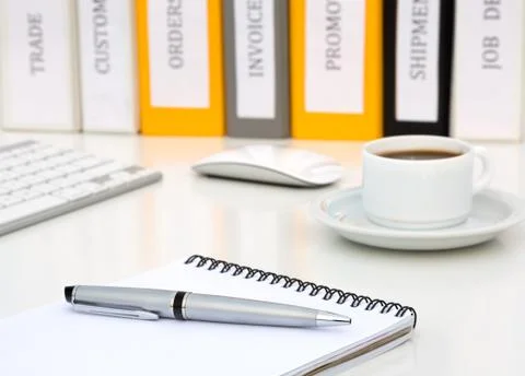 White Office Table with Notepad Executive Class Grey Metal Pen Coffee Computer Stock Photos