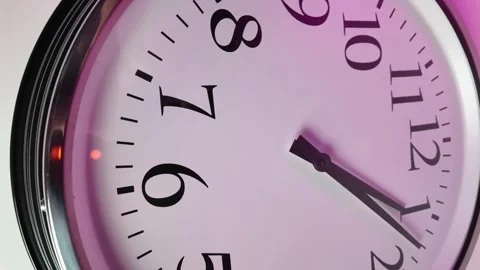 White Office Wall Clock Under Pink Light, Counting Down to Two Stock Footage 304770473