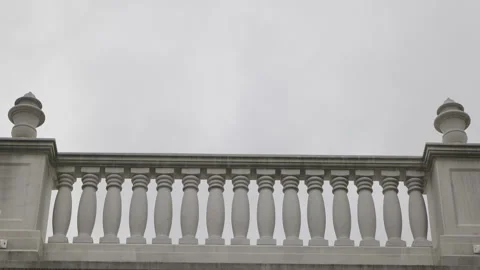 White old marble balcony in front of overcast sky Stock Footage 170373809
