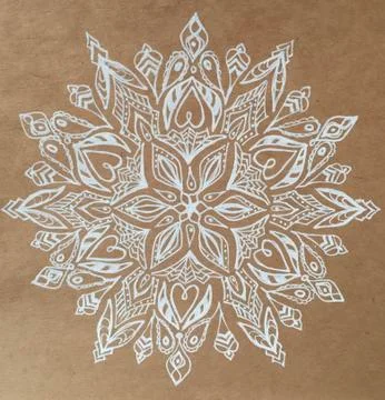 White openwork snowflake on craft paper Stock Illustration