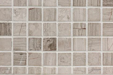 White or gray ceramic wall and floor tiles abstract background. Stock Photos