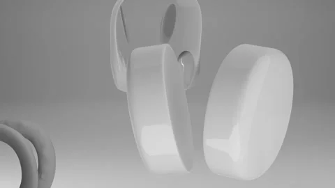 White over-ear headphones assembling on white background. 3D rendering.. Stock Footage 288981596