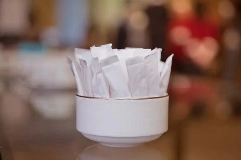 White package for sugar clipping path in the bowl Stock Photos