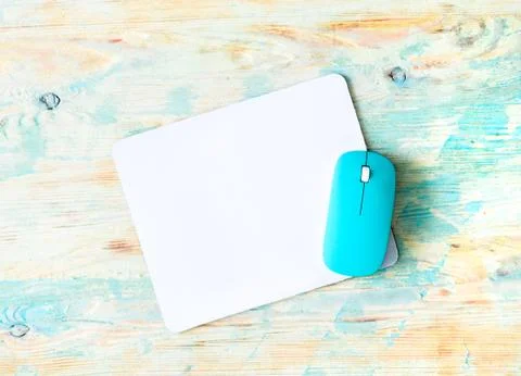 White pad with blue mouse Stock Photos