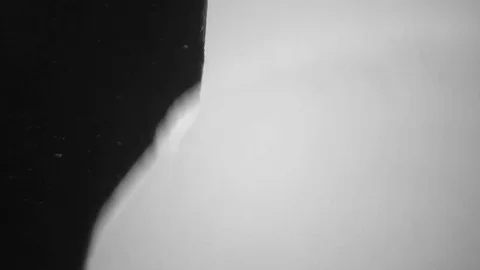White Paint on a Black Background Stock Footage 83448354
