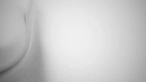 White Paint on a Black Background Stock Footage 83455364