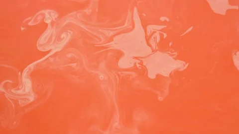 White Paint Blurs into Patterns on Orange Water, Slow Motion. Orange Abstract Ba Stock Footage 169931848