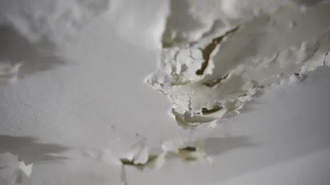 White paint falling and peeling off ceiling or wall in bathroom or shower Stock Footage 268799913