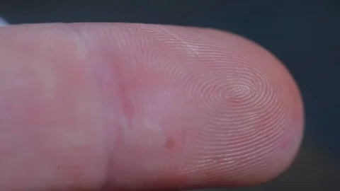 White Paint on Fingers Macro Stock Footage 126908800