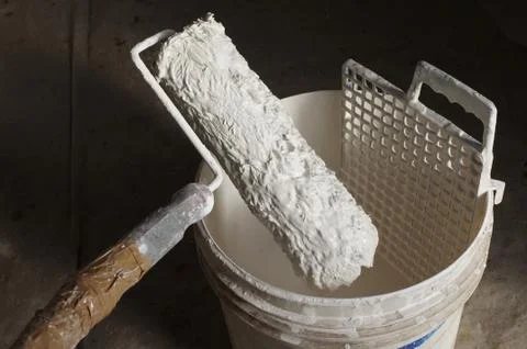 White paint roller Stock Photos