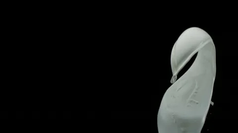 White paint splash in midair, Slow Motion Stock Footage 9304606
