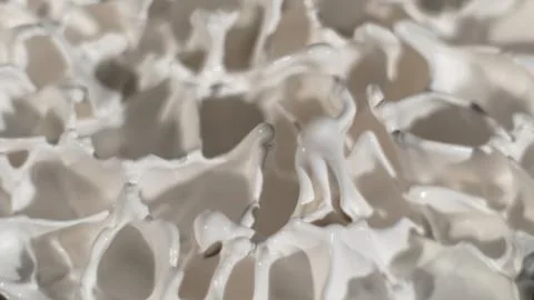 White paint splatter background; macro texture Stock Photos