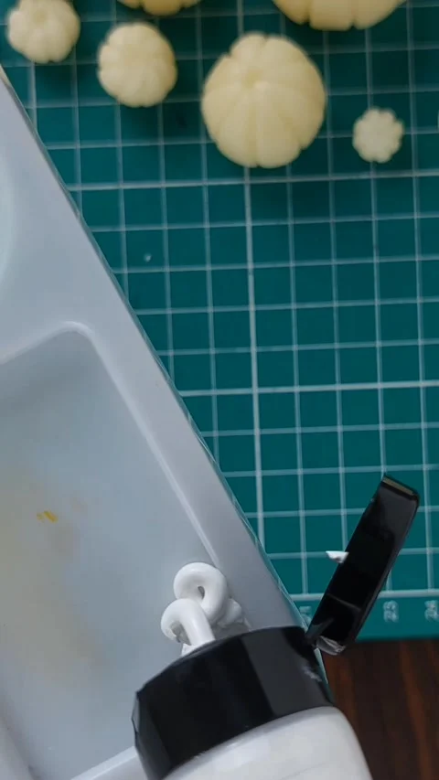 White paint squeezed onto palette for handmade craft project. Stock Footage 346277107