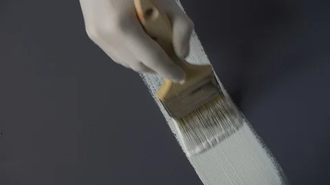 White paint stroke on black background / canvas. Stock Footage 120618000