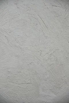 White paint texture with a pattern. Texture wallpaper. Stock Photos