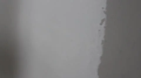 White paint on wall with Roller Stock-Footage 43963903