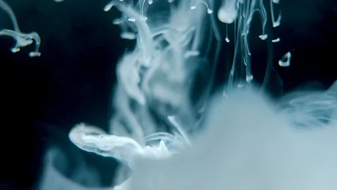 White Paint In Water In Slowmotion Stock Footage 129309752