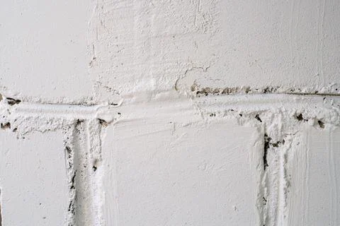 White painted block wall texture. White concrete bricks Stock Photos