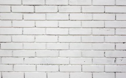 White painted brick wall background close up. Photos