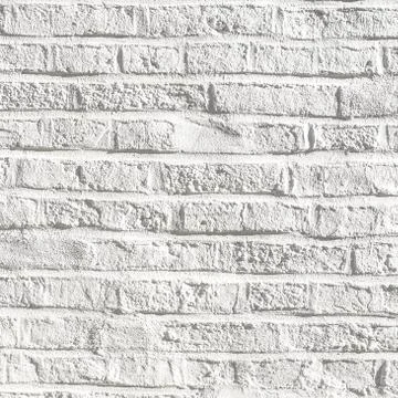 White painted bricks at an old house wall Stock Photos
