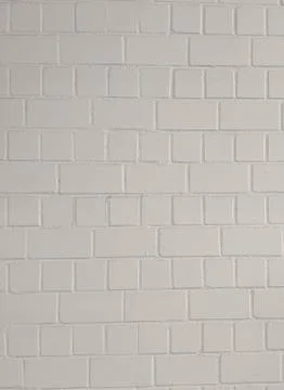 White painted smooth brick wall, for texture or background material Stock Photos