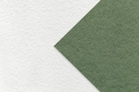 White paper background, two colors with green arrow, . Craft olive cardboard. Stockfoto's