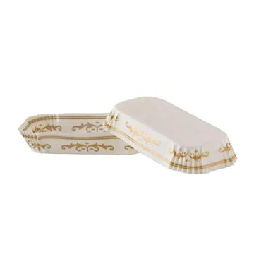 White paper baking form for eclairs and cakes with golden pattern Stock Photos