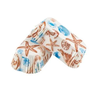 White paper baking forms for cakes with sea life pattern Stockfoto's