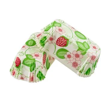 White paper baking forms for cakes with strawberry and flowers pattern Stock Photos