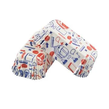 White paper baking forms for cakes with school stuff pattern Stock Photos