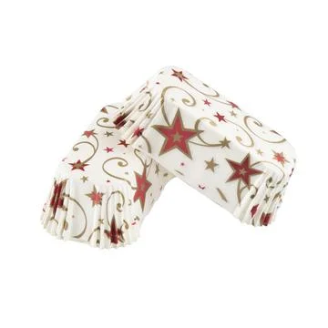 White paper baking forms for cakes with stars pattern Foto stock