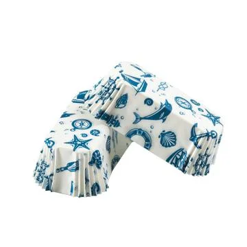 White paper baking forms for cakes with ocean life pattern Stockfoto's